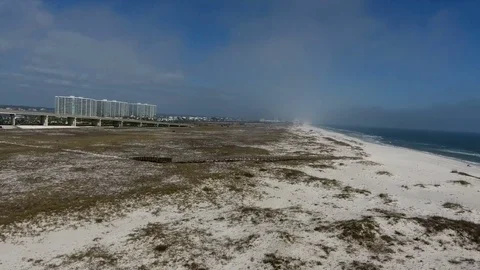 Beach fly over sand buildings Stock Footage 80733250