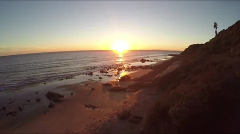 Beach flyover at sunset Stock Footage 58020935