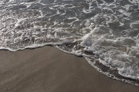 Beach foam Stock Photos