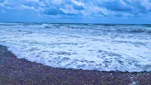 Beach Foaming Ocean Waves Sky Covered with Stormy Clouds Horizon, Slow Motion. W Stock Footage 282794987