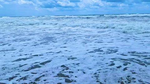 Beach Foaming Waves in the Sea Sky Covered with Rain Cumulus Clouds Horizon, Slo Stock Footage 282794992