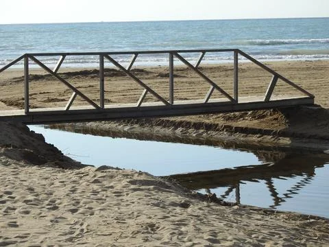 Beach foot bridge Stock Photos