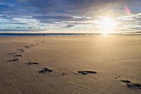 Beach footprints Stock Photos