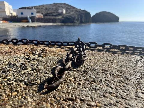 Beach front dock with chain Stock Photos