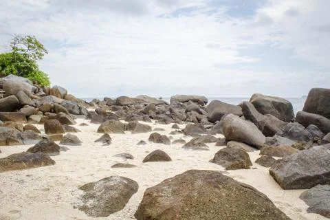 Beach Full of Rocks Stock Photos