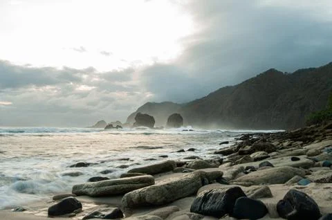 A beach full of rocks Stock Photos
