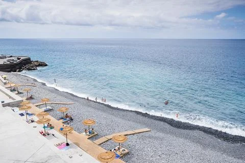 Beach goers on Formosa  beach between Funchal and Camara de Lobos Stock Photos