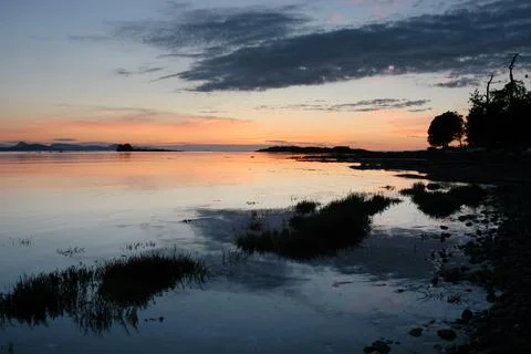Beach grasses at sunset, Cabbage Island, Southern Gulf Islands, British Colum Stock Photos