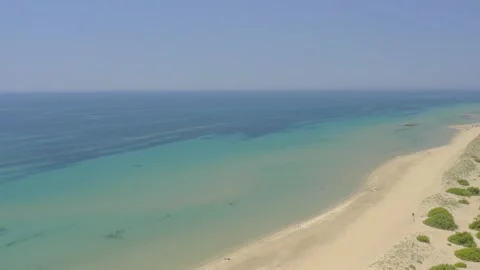 Beach in Greece is empty during the season due to restrictions caused by covid. Video stock 148553805