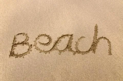 Beach hand written in sand Foto stock