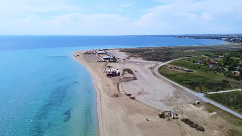 Beach with the hard works on preparing the beach for beach bar. Aerial view Stock Footage 157013615