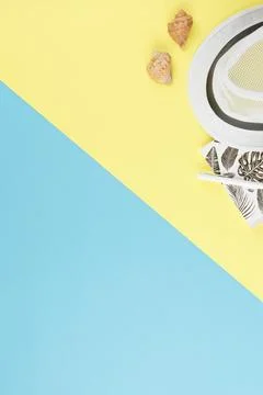 Beach hat with shells, notebook and pen Stock Photos