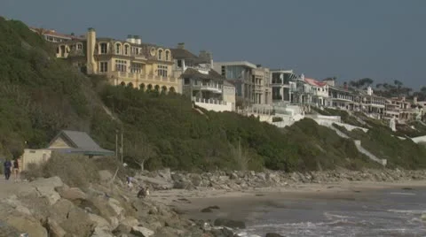 Beach Homes on Cliff Overlooking Pacific Ocean Stock Footage 11495633
