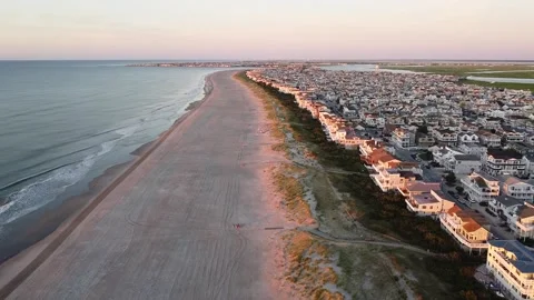 Beach homes during a sunrise Video stock 138724985