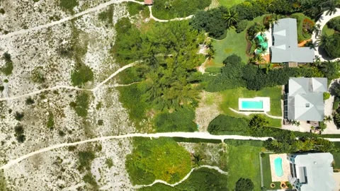 Beach homes with paths to the beach Stock Footage 239550619