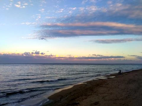 Beach horizon view at sunset Stock Photos