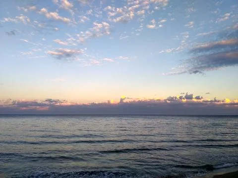 Beach horizon view at sunset Stock Photos