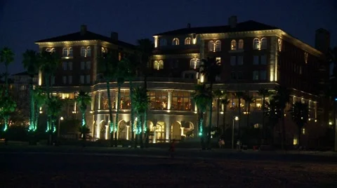 Beach Hotel Lit up at Night Stock Footage 10902937