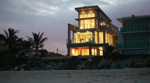 Beach house at dusk Stock Footage 802788