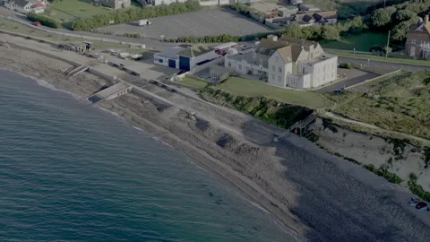 A beach with a house on it Stock Footage 298280754