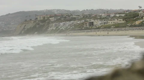 Beach with houses in background Video stock 39221033