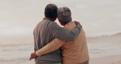 Beach hug, back and senior couple, man or old woman bonding, relax and enjoy Stock Footage 254844942