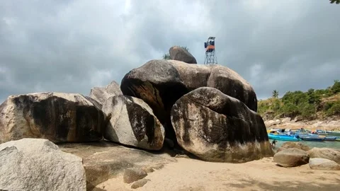 Beach with huge rock formation Stock Footage 279226514
