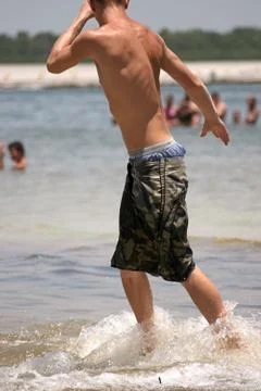 Beach Hunk Foto stock