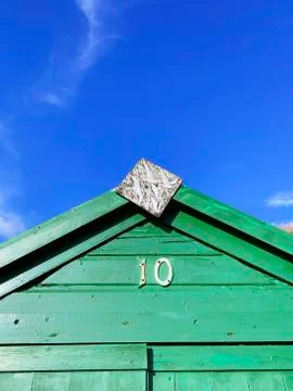 Beach Hut with a deep blue sky Stock Photos