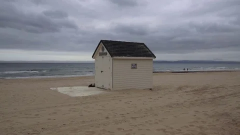 Beach hut house on the beach Stock Footage