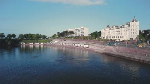 Beach Huts and Torre Abbey Sands, Torquay, Devon, England Stock Footage 194401631