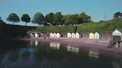 Beach Huts and Torre Abbey Sands, Torquay, Devon, England Stock Footage 194402632