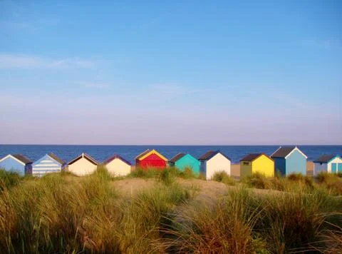 Beach huts on beach Foto stock