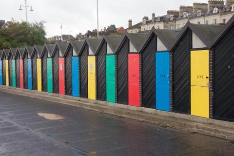 Beach huts on beach Stock Photos