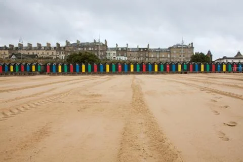 Beach huts on beach Stock Photos