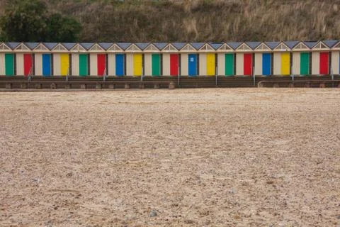 Beach huts on beach Stock Photos