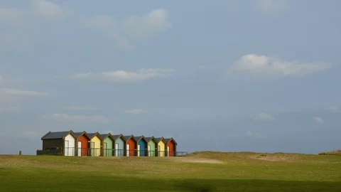 Beach huts at Blyth beach time-lapse Stock Footage 101786979