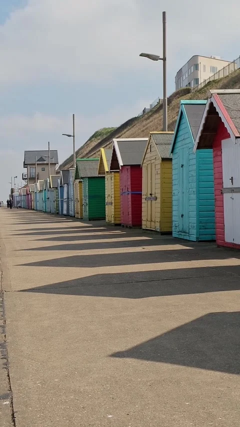 Beach huts on the promenade 스톡 동영상 306318480