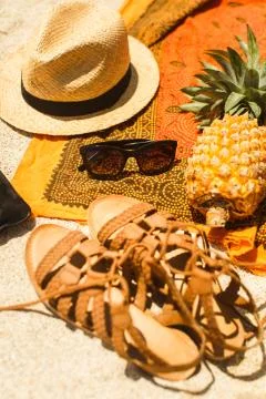 Beach image: sandals, bikini, hat and glasses Stock Photos