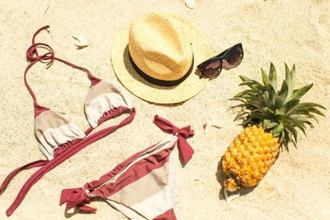 Beach image: sandals, bikini, hat and glasses Stock Photos