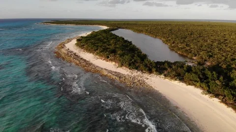 Beach Inlet Sunset Drone Shot - Malcolm Beach - Turks and Caicos, 4K Stock Footage 122263077
