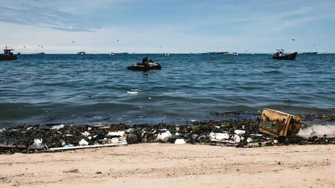 Beach invaded by garbage, pollution of the sea Stock-Footage 86466878