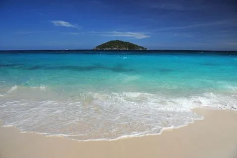Beach with island Stock Photos