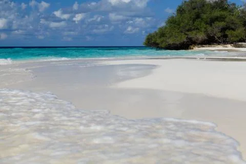 The beach on an island with waves Stock Photos