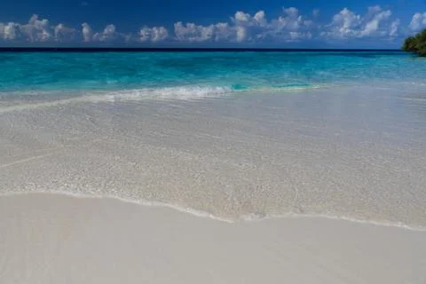 The beach on an island with waves Stock Photos