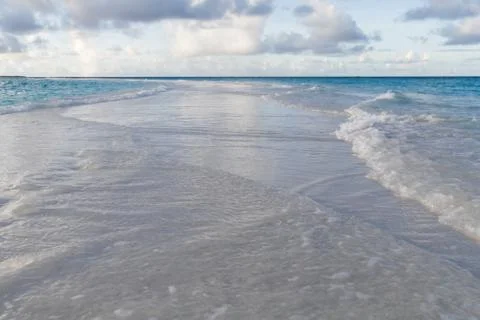 The beach on an island with waves Stock Photos