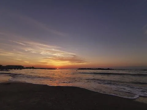 Beach in Italy's Romagna Riviera at sunset Stock Photos