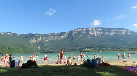 On the beach at the lake Stock Footage 66491347