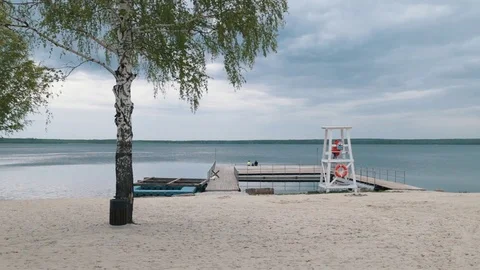 Beach on the lake Stock Footage 75999765