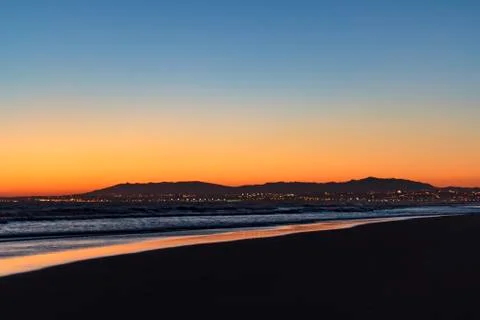 Beach landscape at sunset Stock Photos